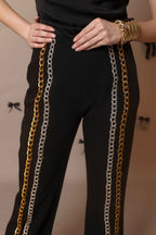 Chain Reaction Flared Trousers – Dual Metal Detail - Vybtheory