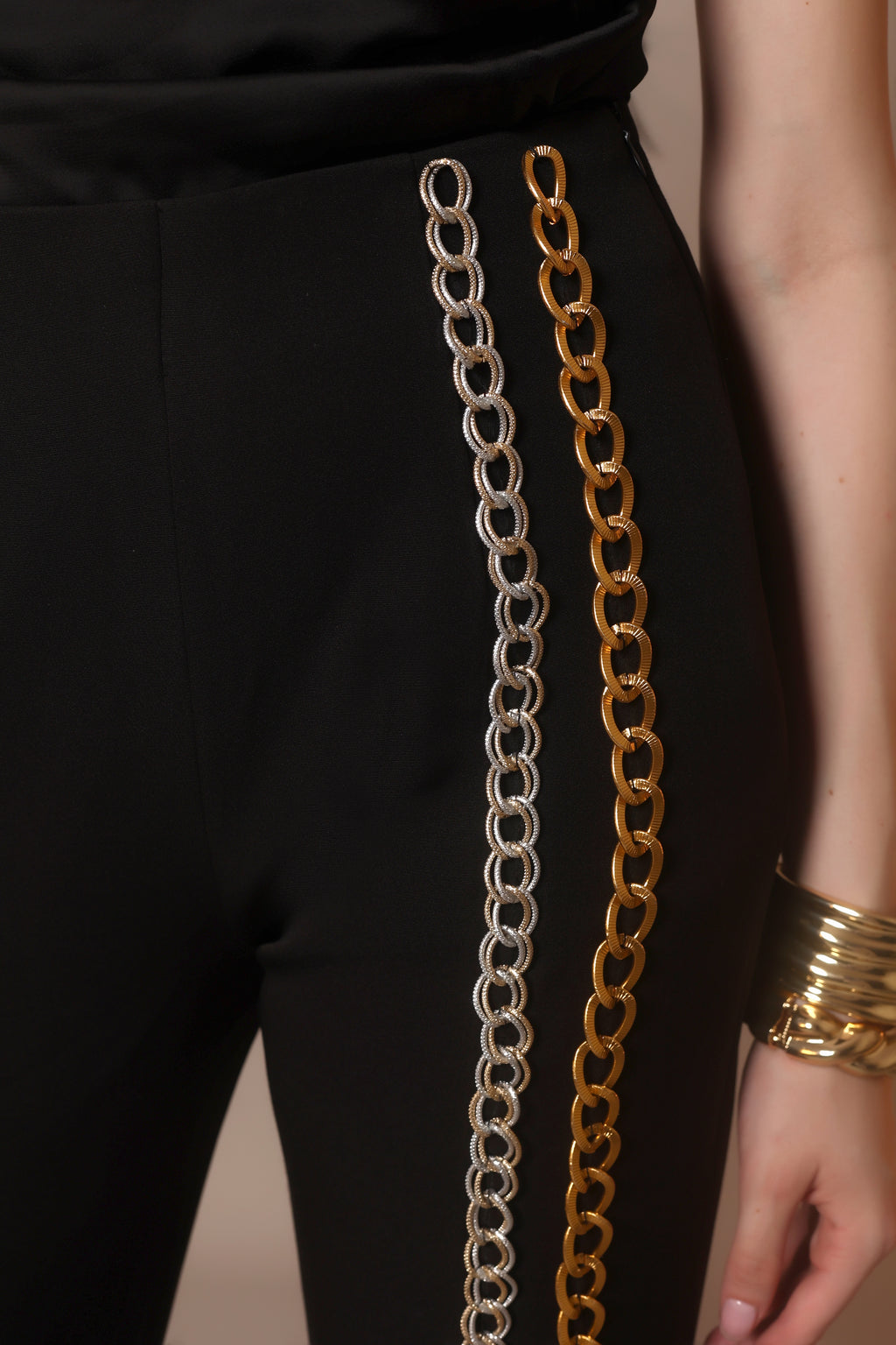 Chain Reaction Flared Trousers – Dual Metal Detail
