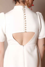 Ivory Bow-Back Mini Dress with Puff Sleeves – Pearl Button Detail - Vybtheory